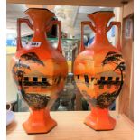 PAIR OF ORANGE TWIN HANDLED VASES