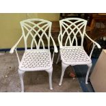 TWO CAST METAL LATTICE BACK GARDEN CHAIRS