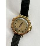 LADIES 9CT GOLD CASED OCTAGONAL WRISTWATCH ON FABRIC STRAP