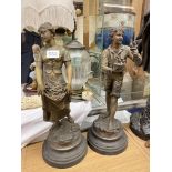 PAIR OF PATINATED SPELTER FIGURES OF COUNTRY FLOWER GATHERER AND BOY WITH BIRD IN NEST