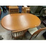 TEAK CROSSBANDED OVAL DINING TABLE AND FOUR CHAIRS