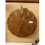 WALNUT FRONTED ART DECO CIRCULAR WALL CLOCK WITH KEY PURPORTEDLY FROM THE QUEEN'S HOTEL,