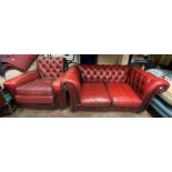 OXBLOOD BUTTONED LEATHER CHESTERFIELD SOFA AND A BUTTONED BACKED CLUB ARMCHAIR