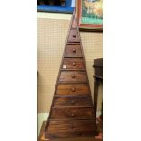 HARDWOOD EIGHT DRAWER PYRAMID CHEST