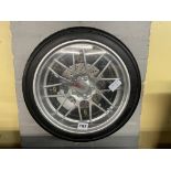 BATTERY WALL CLOCK IN FORM OF A CAR WHEEL