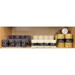 SHELF OF SPAAS AND RUSTIK CANDLES PLUS CLASSIC CANDLES