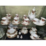 TWO SHELVES OF ROYAL ALBERT OLD COUNTRY ROSES BONE CHINA TEA SERVICE AND DINNER SERVICE