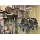 UNMARKED GLOSS MODEL OF AN ELEPHANT AND TO SMALLER ELEPHANT FIGURES