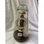 20TH CENTURY SKELETON CLOCK UNDER TAPERED DOME