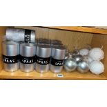 SHELF OF SPAAS CLASSIC SILVER PILLAR CANDLES AND BAUBLE CANDLES