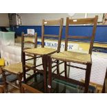 PAIR OF EDWARDIAN LINE INLAID AND RAFFIA SEATED BEDROOM CHAIRS AND SMALLER LADDER BACK BEDROOM