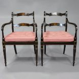 Pair of Regency Ebonized and Painted Open Arm Chairs, 19th century, 32.5 x 21 x 17 in — 82.6 x 53.3