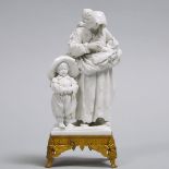 'Sèvres' White Glazed Figure Group of a Mother and Children, late 19th century, overall height 7.1 i