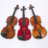 Three Continental Violins, early to mid 20th century, each body length 14 in — 35.6 cm (3 Pieces)