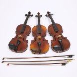 Three Continental Violins, early to mid 20th century, each body length 14 in — 35.6 cm (3 Pieces)