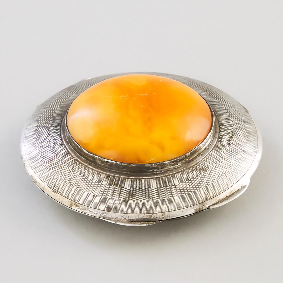 German Silver Circular Compact with Amber Cabochon, 20th century, diameter 3 in — 7.6 cm