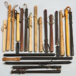 Miscellaneous Collection of 20 Night Sticks and Billy Clubs, 20th century, longest height 31 in — 78