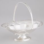 English Silver Pierced Oval Cake Basket, Henry Matthews, Birmingham, 1925, length 10.5 in — 26.7 cm