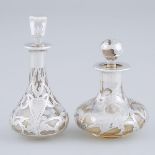 Two American Silver Overlaid Glass Perfume Bottles, early 20th century, height 5 in — 12.7 cm; heig