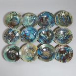 Kayo O'Young (Canadian, b.1950), Twelve Blue and Red Glazed Soup Plates, 1989, approx. diameter 9.4