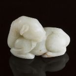 A Mottled White Jade Carving of a Recumbent Ram, Ming Dynasty, 17th Century, 明 十七世纪 青白玉卧羊, 2 in — 5.