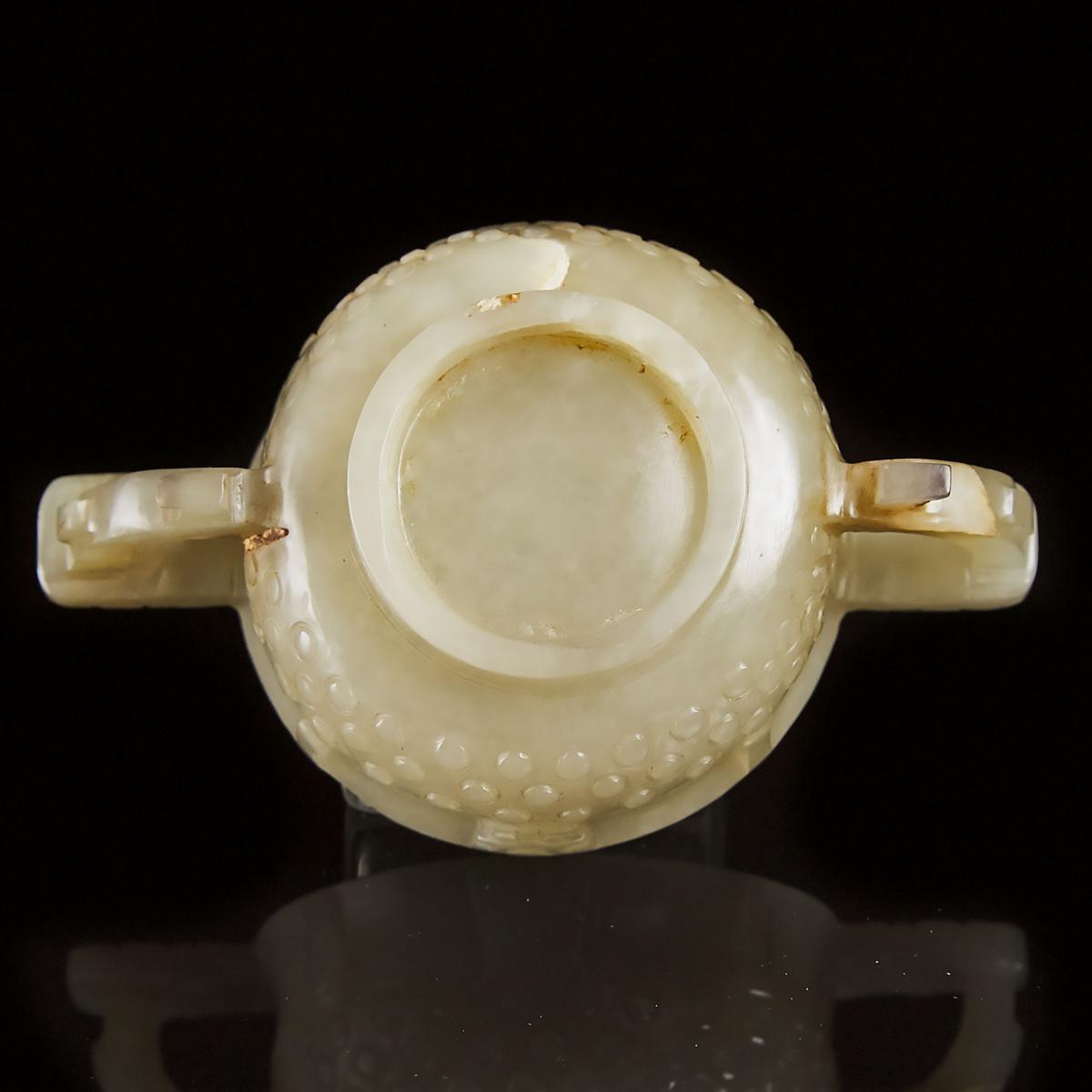 A Chinese Archaistic Celadon White Jade Libation Cup, Ming Dynasty, 17th Century, 明 青白玉雕乳钉兽面纹杯, 1.4 - Image 4 of 6