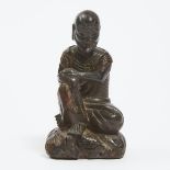 A Wood Carved Figure of a Luohan, 19th Century, 十九世纪 木雕罗汉, height 5.7 in — 14.4 cm