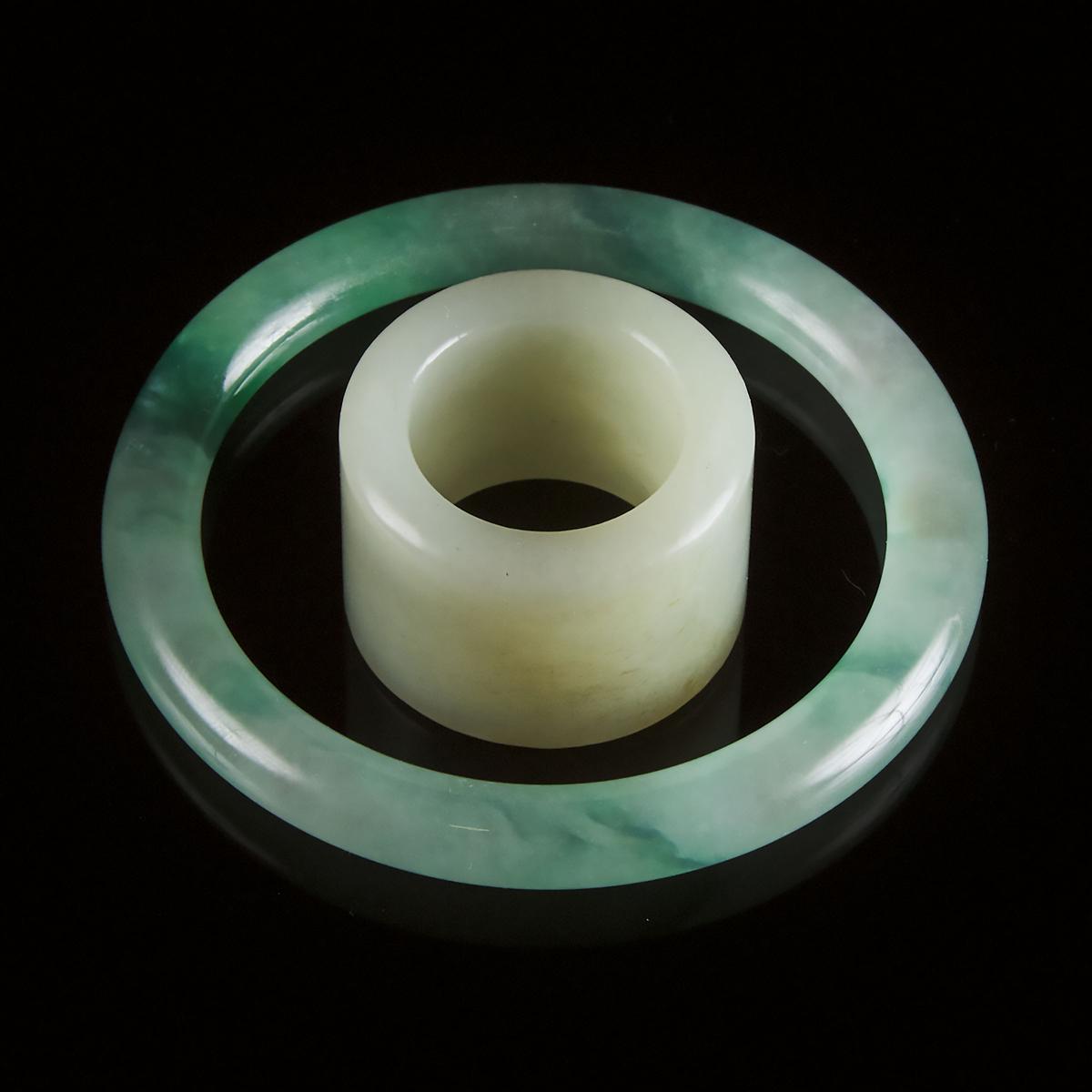 A White Jade Archer's Ring, Together With a Jadeite Bangle, 白玉雕扳指 翡翠镯一组两件, bangle diameter 3 in — 7. - Image 2 of 2