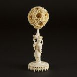 A Chinese Ivory Puzzle Ball and Stand, Circa 1900, 约1900年 牙雕鬼工球带座, overall height 8.8 in — 22.4 cm