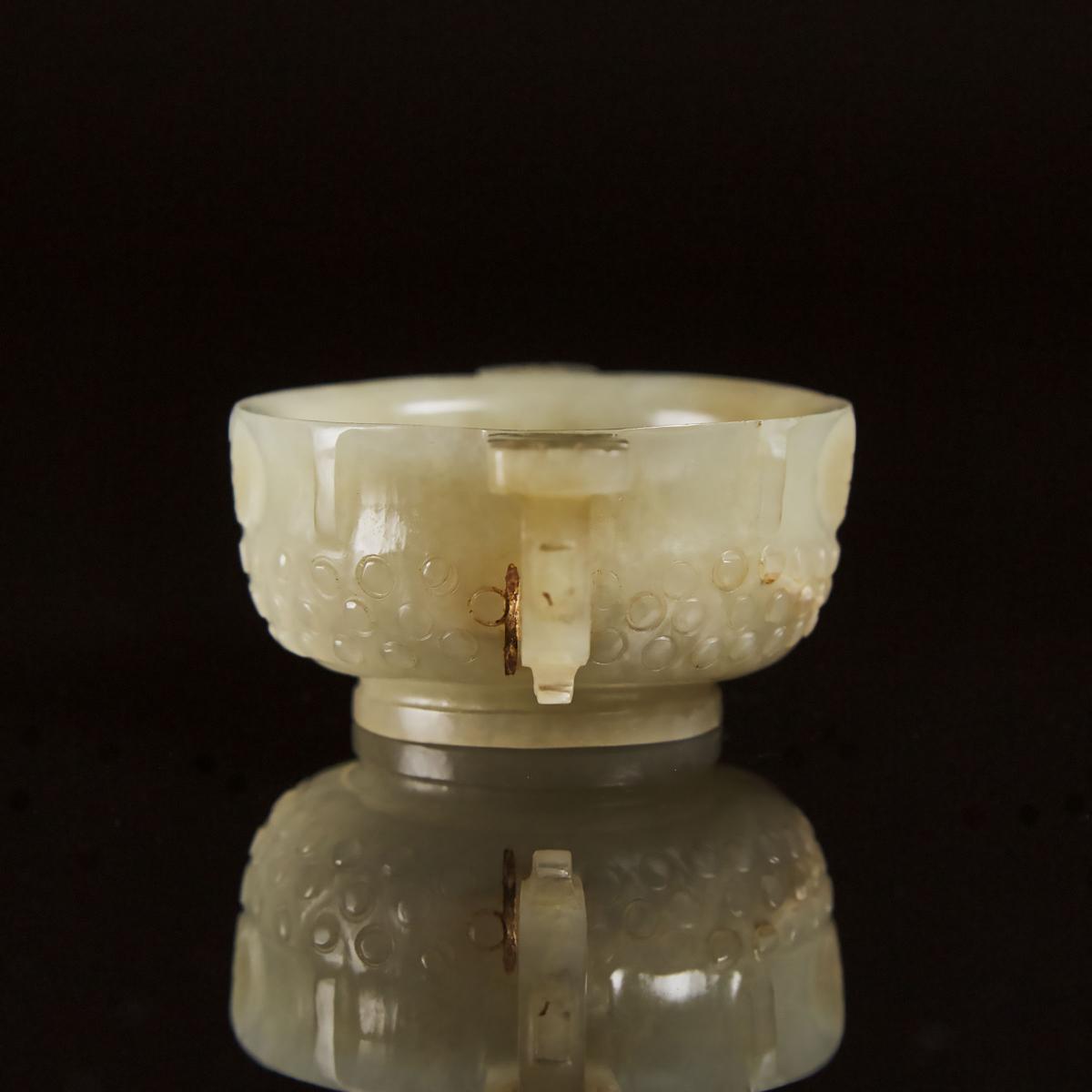 A Chinese Archaistic Celadon White Jade Libation Cup, Ming Dynasty, 17th Century, 明 青白玉雕乳钉兽面纹杯, 1.4 - Image 5 of 6