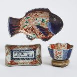 An Imari Fish-Shaped Platter, Together With an Imari Bowl and Rectangular Platter, Meiji Period, 19t
