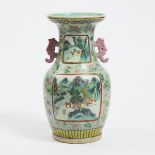 A Canton Enameled Celadon Vase, Late 19th/Early 20th Century, 晚清/民国时期 广彩盘口开窗山水人物象耳瓶, height 13.8 in