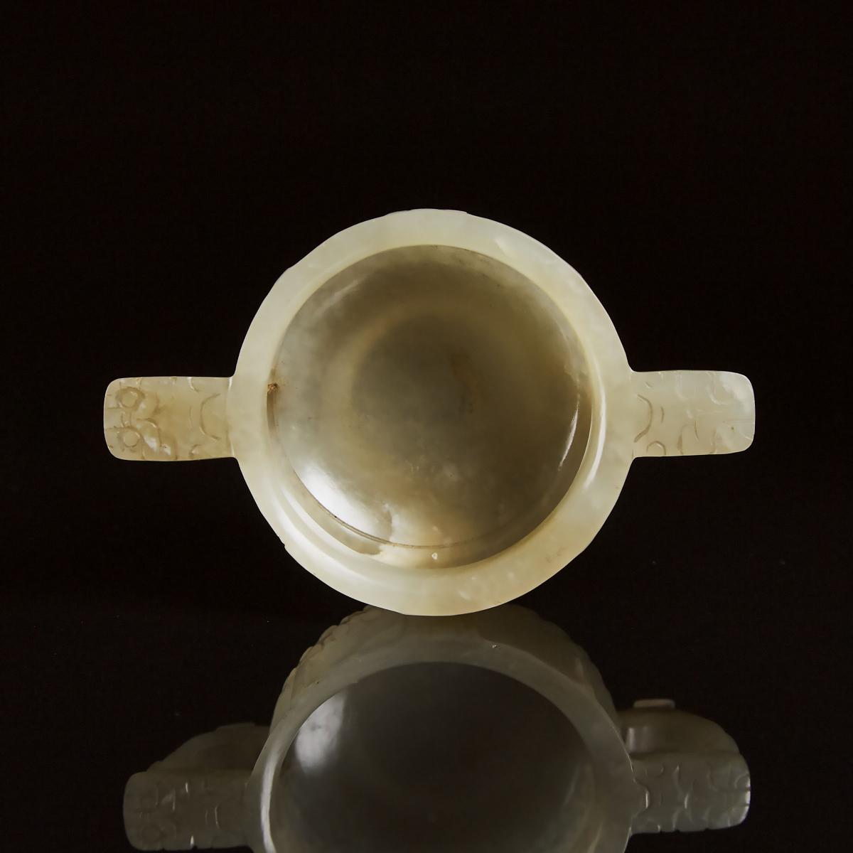 A Chinese Archaistic Celadon White Jade Libation Cup, Ming Dynasty, 17th Century, 明 青白玉雕乳钉兽面纹杯, 1.4 - Image 3 of 6