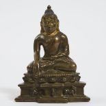 A Silver and Copper inlaid Bronze Buddha, Tibet, 14th Century, 十四世纪 西藏嵌银铜佛, height 6.1 in — 15.5 cm