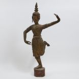 A Southeast Asian Wood Figure of a Dancer, Mid 20th Century, height 55 in — 139.7 cm