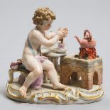 Meissen Figure of a Putto Making Hot Chocolate, late 19th century, height 4 in — 10.2 cm
