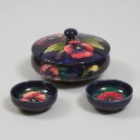 Moorcroft Pansy Covered Jar and Two Small Bowls, c.1950, diameter 5.9 in — 14.9 cm; diameter 3.1 in