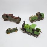 Group of Four Painted Wood Toy Train Engines, early-mid 20th century, longest length 30 in — 76.2 cm