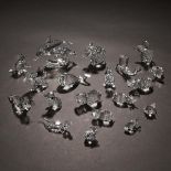 Nineteen Swarovski Crystal Animal Figures, late 20th/early 21st century, dolphins height 3.1 in — 8