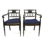 Pair of French Directoire Ebonized and Parcel Gilt Open Armchairs, early 19th century, 32.5 x 21 x 2