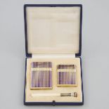 Enameled and Engraved Silver-Gilt Cigarette Case, Card Case and Cigarette Holder, 20th century, hold