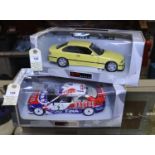 2 UT Models 1:18 BMW. An M3 E36 racing Saloon. An example in white, red and blue FINA/BASTOS livery,