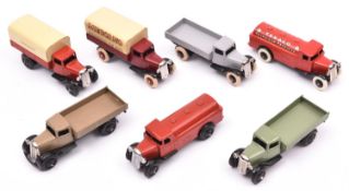 9 Dinky Toys 25 series trucks. 25a Wagon. Type 2 in light grey. Petrol Tank Wagon 25d in red and a