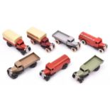 9 Dinky Toys 25 series trucks. 25a Wagon. Type 2 in light grey. Petrol Tank Wagon 25d in red and a