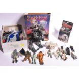 A quantity of toys and figures from the 1980s. Including 2x boxed Zoids; Mighty Zoidzilla and Slime,
