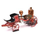A rare Marklin 4-wheel horse drawn spirit fired fire engine c.1902. Of cast iron and tinplate