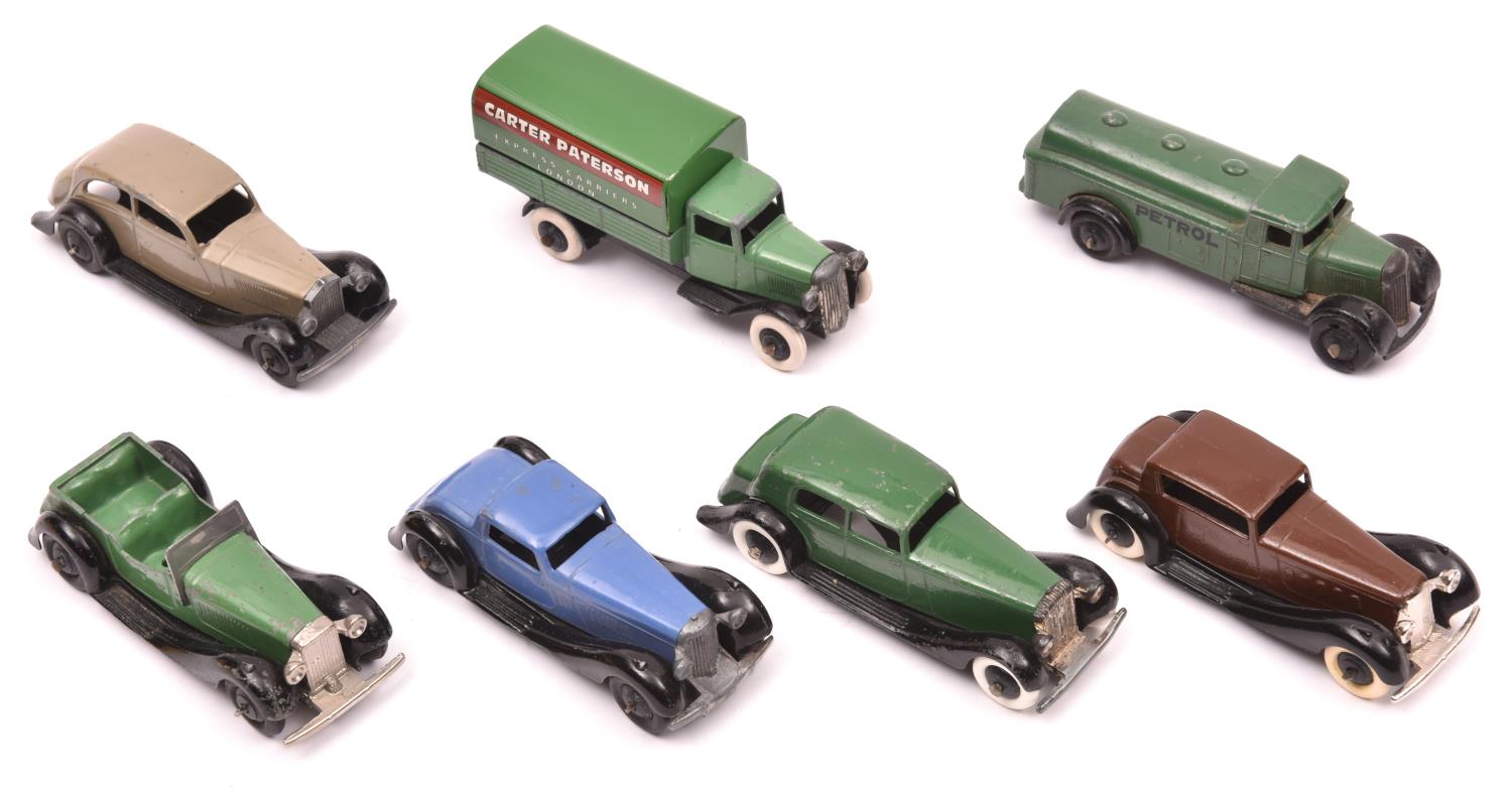 7 Dinky Toys. Daimler 30c in dark green with black smooth wheels. Rolls Royce 30b in fawn. British
