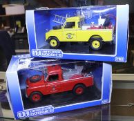 2 Universal Hobbies Land Rovers. A Series II Pick-Up. In yellow West Sussex Fire Brigade livery.