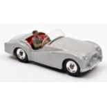 Dinky Toys Triumph TR2 Touring finish (105). In light grey with red interior, with driver and spun