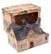 A Spot-On 'Cotswold Village' series building, 'Holly Farm'. Boxed, some age wear/light damage,